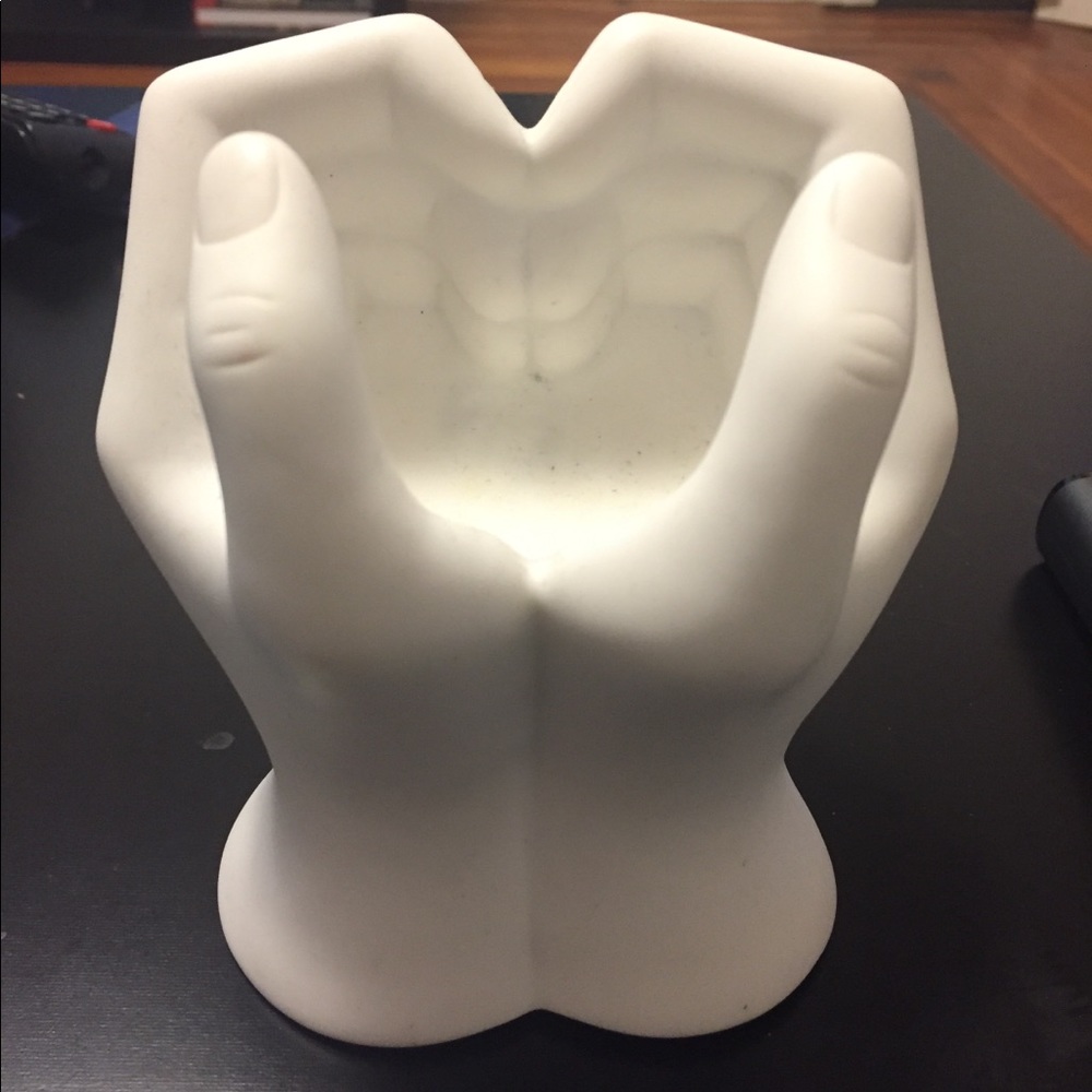 Cellphone holder/paperweight/decorative item